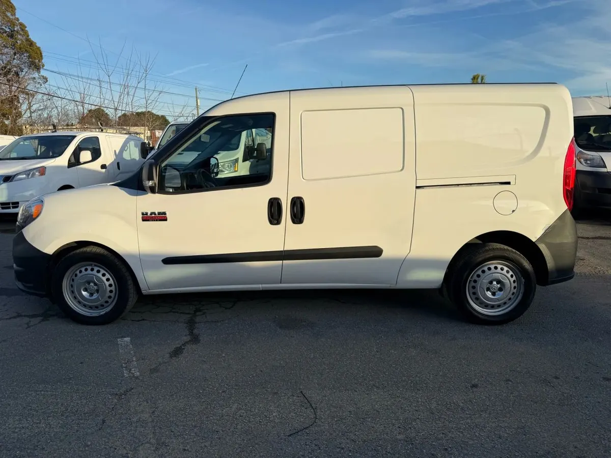 Side profile of a white RAM ProMaster City small cargo van